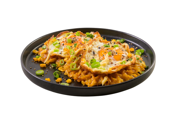 Fried eggs auf Reis-Mais-Waffeln